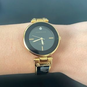 Anne Klein Women's Black and Gold Diamond Dial Bangle Watch